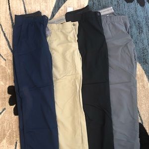 4 pairs of under armour golf pants plus 2 belts